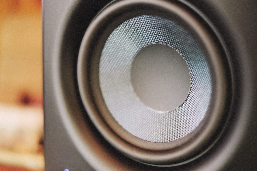 Close-up macro photograph of a speaker driver cone