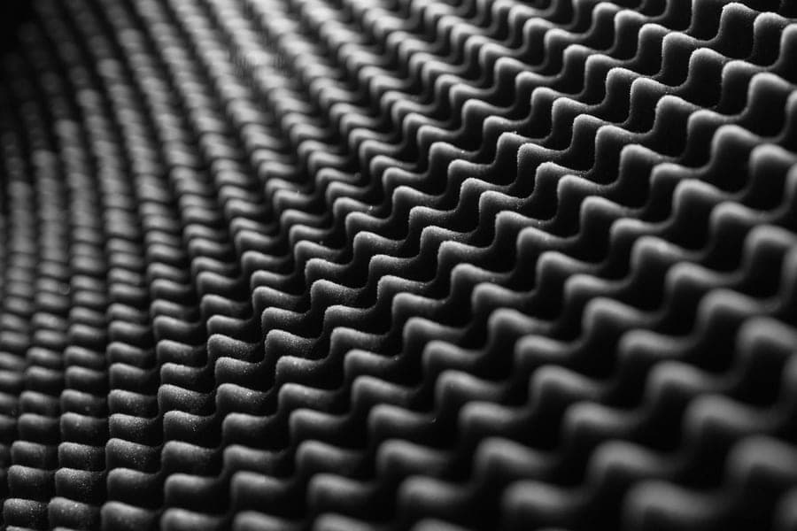Close-up of textured soundproofing foam in black and white