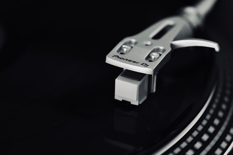 Close-up of a turntable needle resting on a record